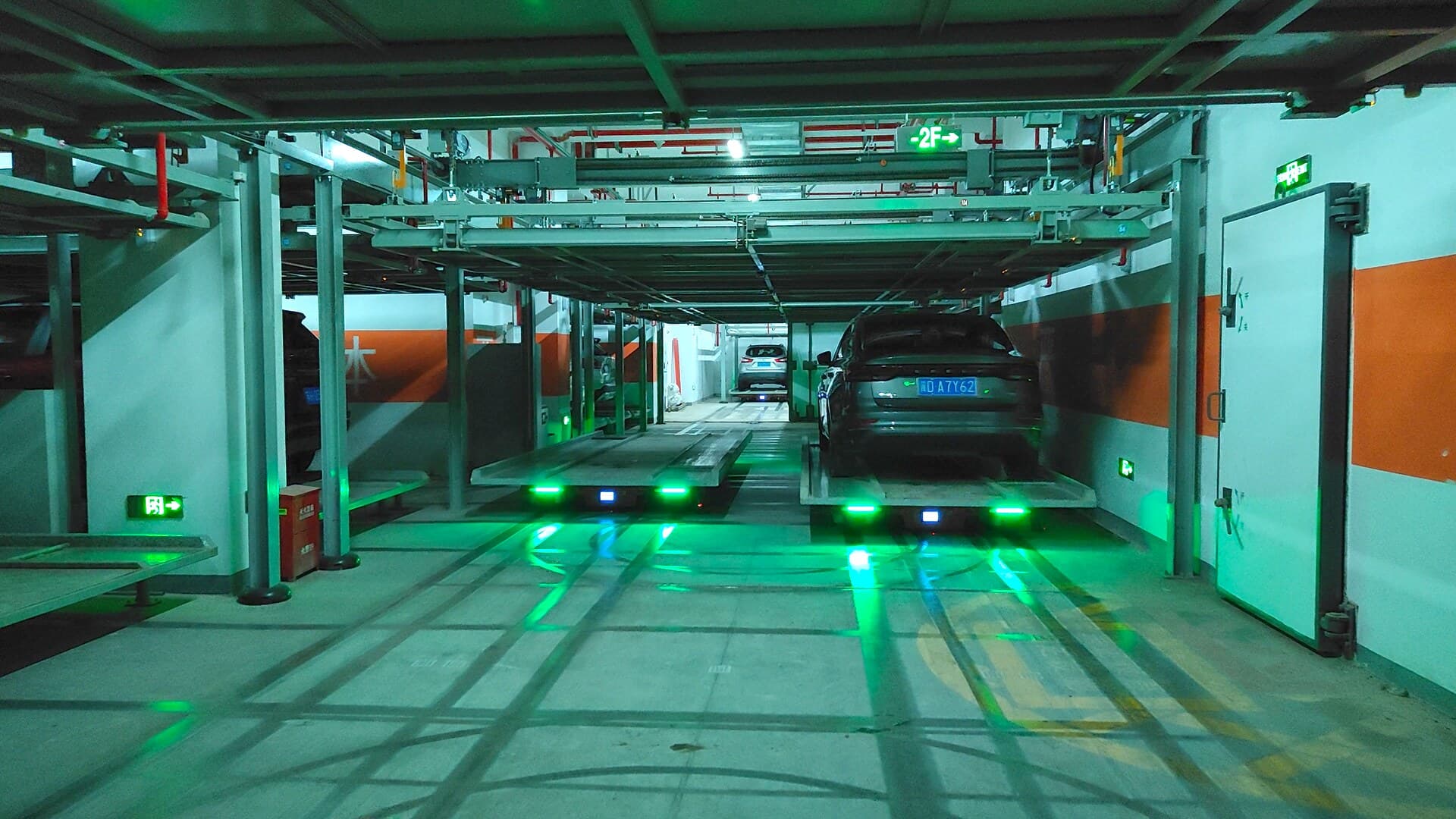 Automated parking system with stacked vehicles